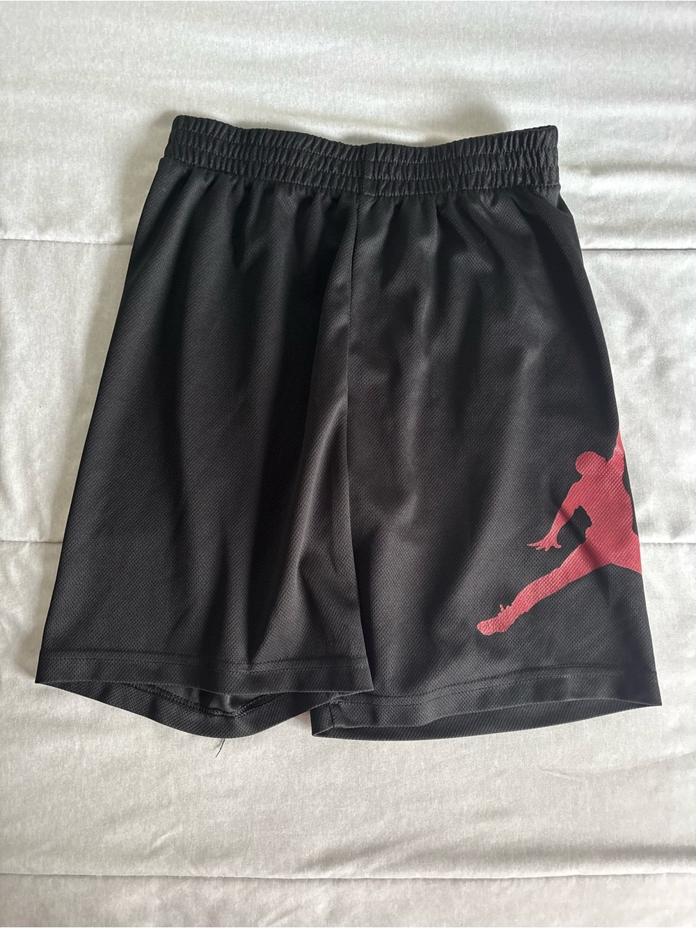 Jordan Black Athletic Shorts with Red Jumpman Graphic